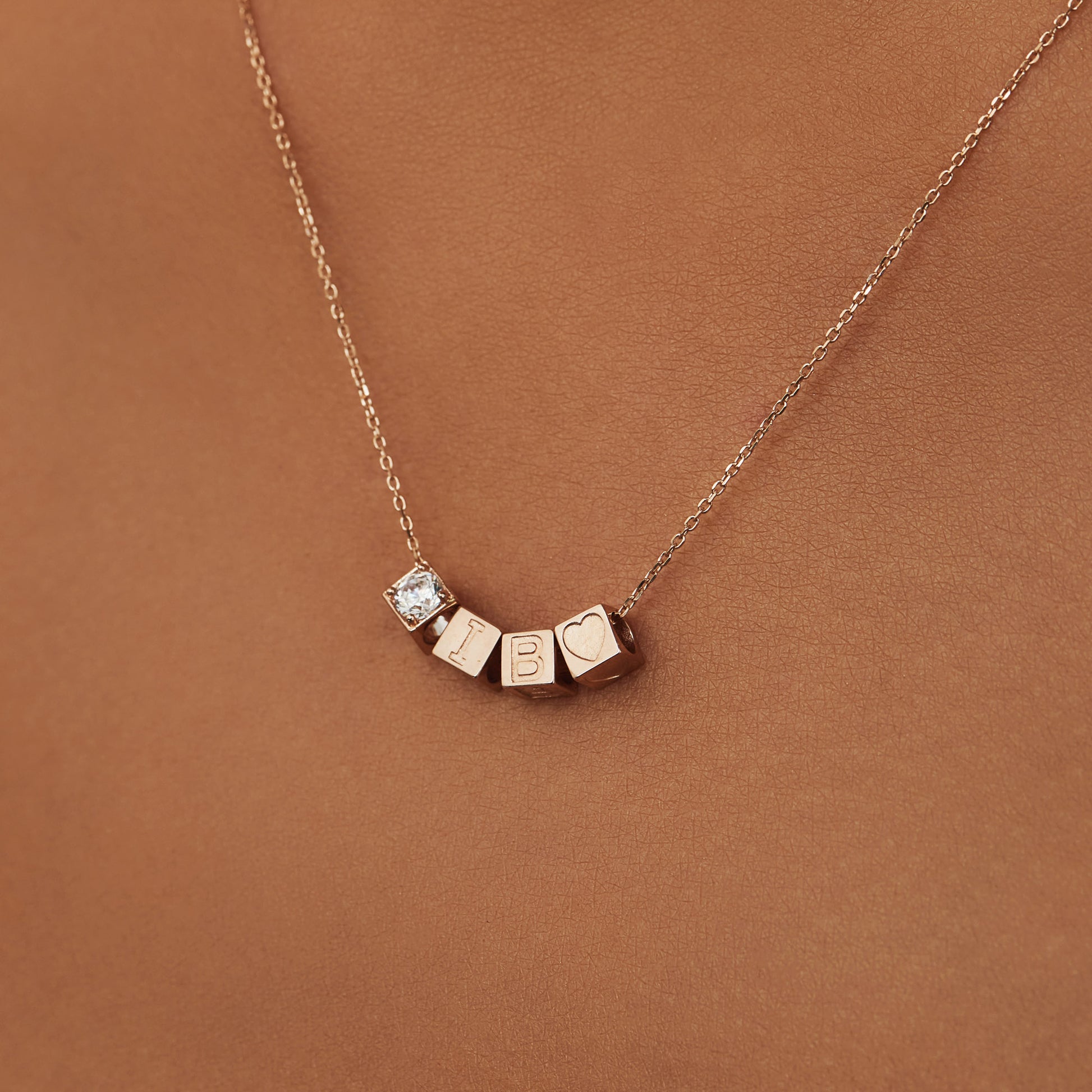 Isabel Bernard La Concorde Felie 14 Carat Rosegold cube Initial Charm IB350047-Z